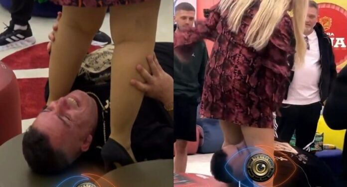 Meri kërcen mbi tavolinë, banori habit me reagimin posa fut koken poshtë këmbëve të saj